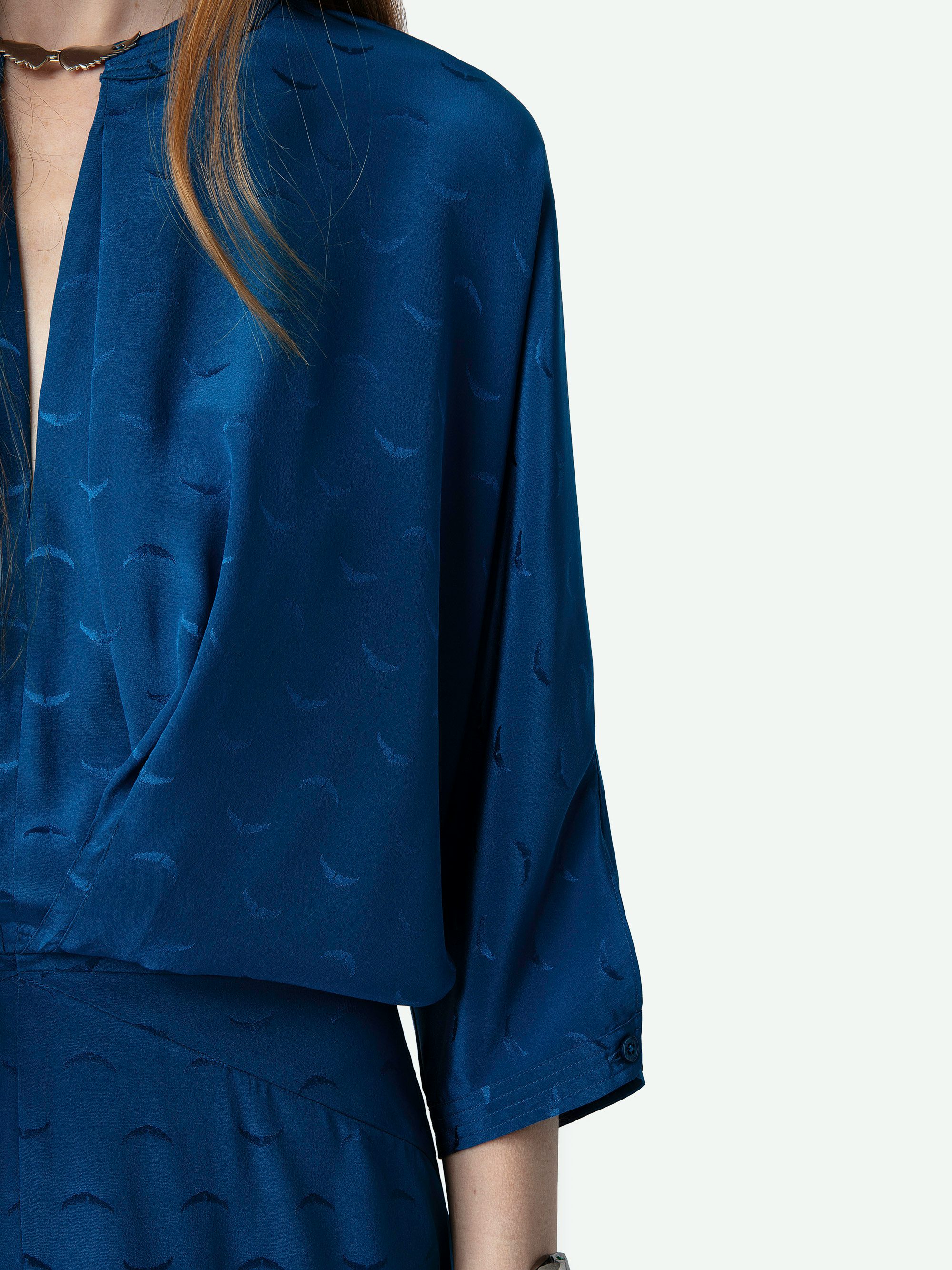 Ritany Jacquard Silk Wings Dress - Blue silk midi dress with jacquard wings design, round neck with wing clasp and 3/4-length batwing sleeves.